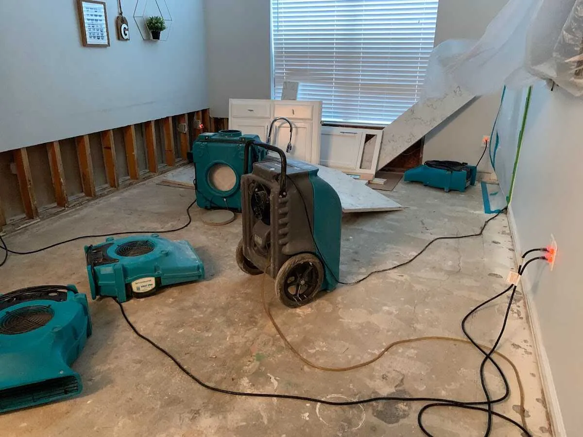 Dehumidifier in flood-cut room for Water Extraction & Removal in Logan
